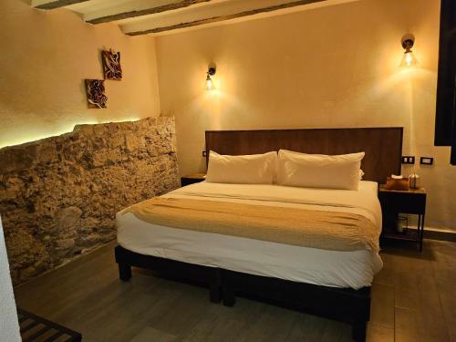 MariaBonita Petit Hotelにあるベッド