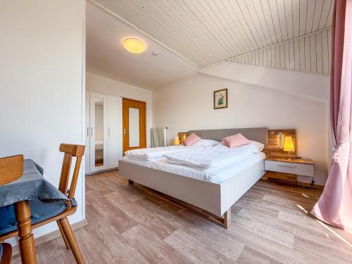 Postel nebo postele na pokoji v ubytování Strengen Guesthouse