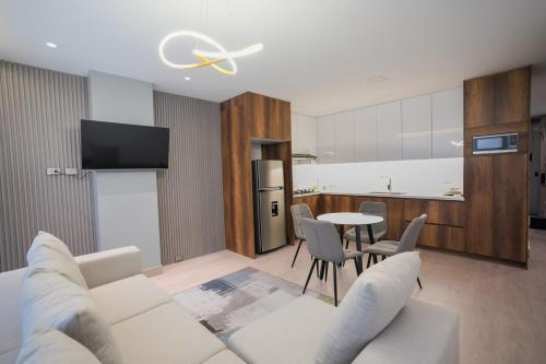 Kuchyň nebo kuchyňský kout v ubytování Loft moderno de lujo junto a UTPL