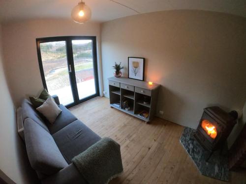 Posezení v ubytování Nykmark-Eco House Private Apartment