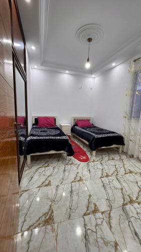 Кровать или кровати в номере Mahdia Apartment N1 Chic et Modern