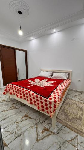 Кровать или кровати в номере Mahdia Apartment N1 Chic et Modern