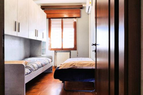 Katil atau katil-katil dalam bilik di San Nicola- 5 min from airport with parking