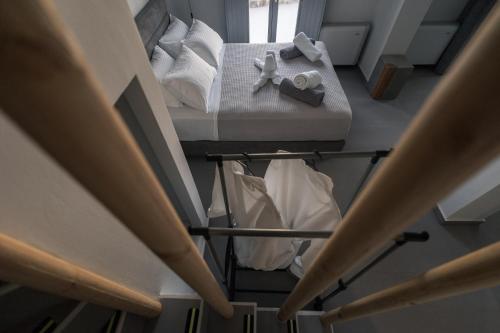 an overhead view of a bed in a room at Uranides Luxury Suites in Santorini