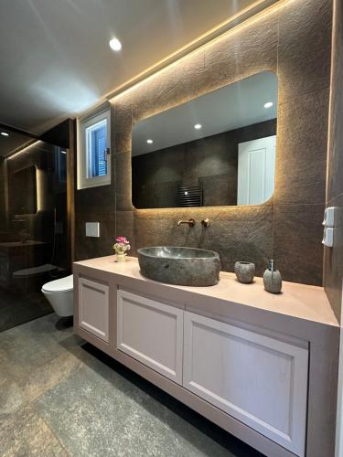 Koupelna v ubytování Elysium Exclusive Villas