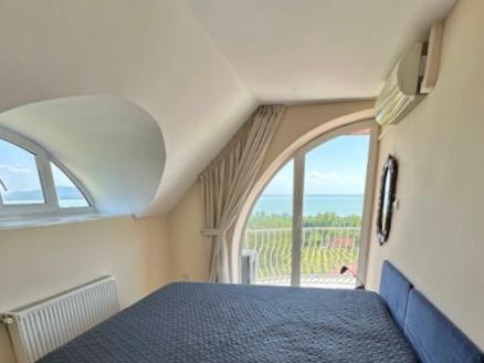 Ένα ή περισσότερα κρεβάτια σε δωμάτιο στο Villa Bellevue