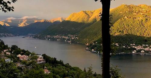a view of a body of water with mountains at Villa Adelaide Lakeview in Como