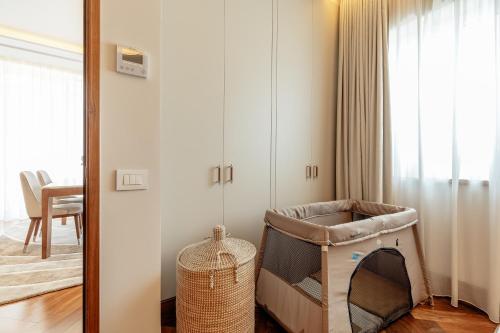 a mirror in a room with a chair and a table at Porto Montenegro in Tivat