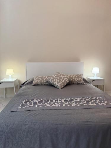 Postel nebo postele na pokoji v ubytování Villa Annunziata