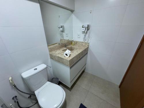 Ένα μπάνιο στο Apartamento Aconchego Araxá