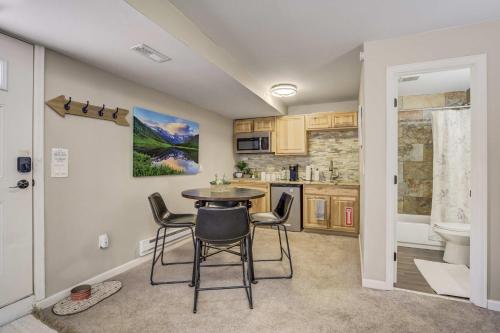 a kitchen and dining room with a table and chairs at Mountain Studio Cozy Escape with Stunning Views in Cascade-Chipita Park