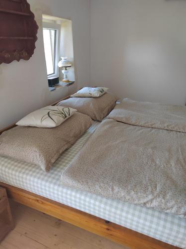 Ein Bett oder Betten in einem Zimmer der Unterkunft Apartmán Kristian