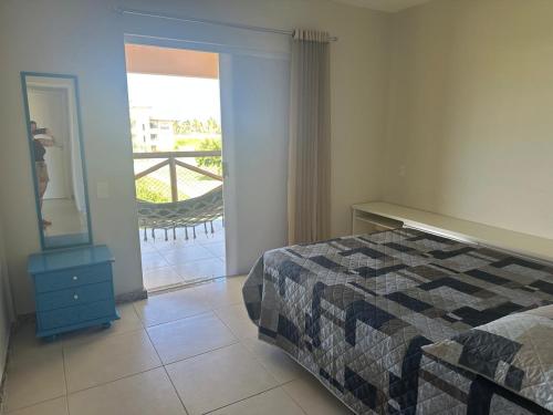 Ένα ή περισσότερα κρεβάτια σε δωμάτιο στο Apartamento Com Ar Cond e WI-FI no Villa das Águas - Praia do Saco