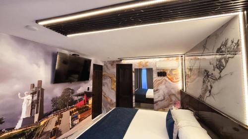 TV a/nebo společenská místnost v ubytování Hotel Bacatá Isla