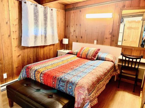 Postel nebo postele na pokoji v ubytování Peachland Beach Resort