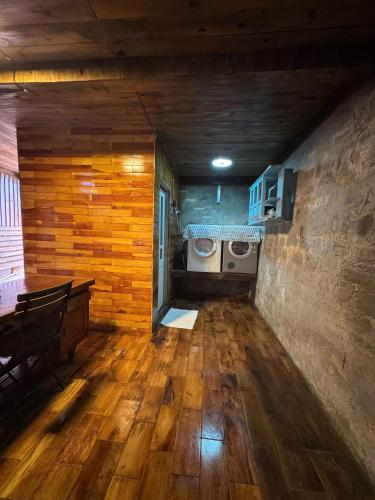 a laundry room with a washer and dryer at Nhà Của Sen in Da Thien