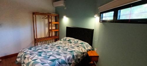 Postel nebo postele na pokoji v ubytování La Plata Loft 66