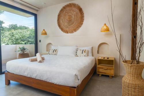 Ένα ή περισσότερα κρεβάτια σε δωμάτιο στο Boho Chic Apartment & Pool