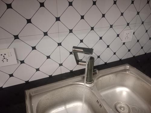 a sink with a faucet in a bathroom at Bahria town karachi Ali block in Karachi