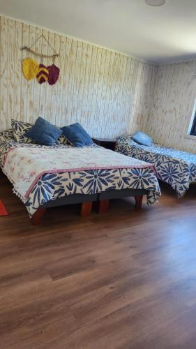Ein Bett oder Betten in einem Zimmer der Unterkunft Cabañas Matanzas Lukai