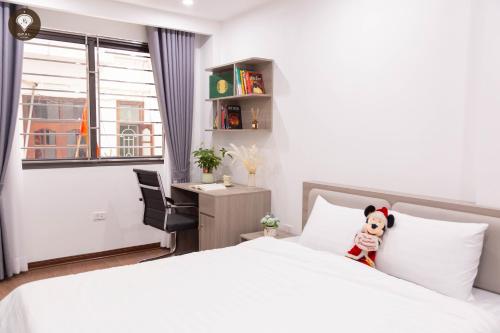 Ένα ή περισσότερα κρεβάτια σε δωμάτιο στο Opal Luxe Serviced Apartment