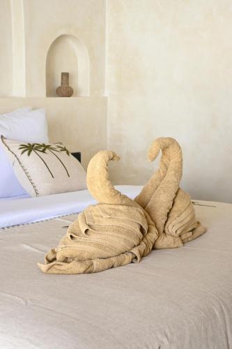 Ένα ή περισσότερα κρεβάτια σε δωμάτιο στο Koa Coco Casa