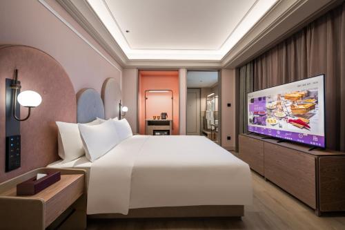 Mercure Jiangyin South Gate Yaohanにあるベッド