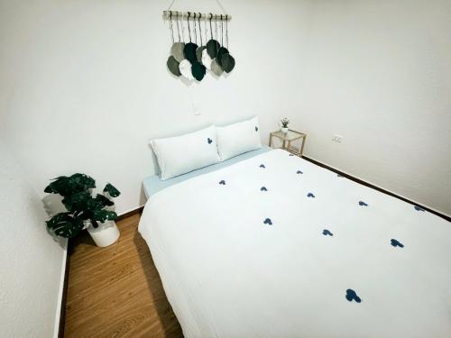 Postel nebo postele na pokoji v ubytování An Nhiên House