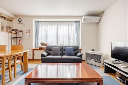Χώρος καθιστικού στο 【One House 】白老駅から徒歩1分/グループ・家族で一棟貸切/ウポポイへのアクセスも抜群