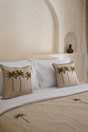 Ένα ή περισσότερα κρεβάτια σε δωμάτιο στο Koa Coco Casa