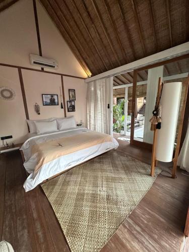 Katil atau katil-katil dalam bilik di Coral Drift Resort & Villas