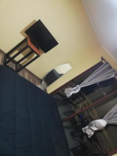 Postel nebo postele na pokoji v ubytování Hotel Bella Vista