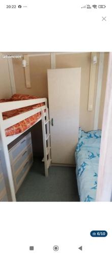 Katil atau katil-katil dalam bilik di Chalet près de la plage