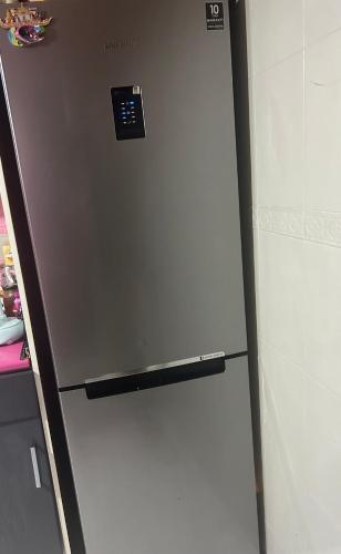a refrigerator in a kitchen with its door open at Apartamento bulevar jacuzzi centro in Burgos