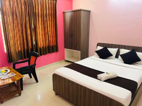 Ένα ή περισσότερα κρεβάτια σε δωμάτιο στο Hotel Golden Stays