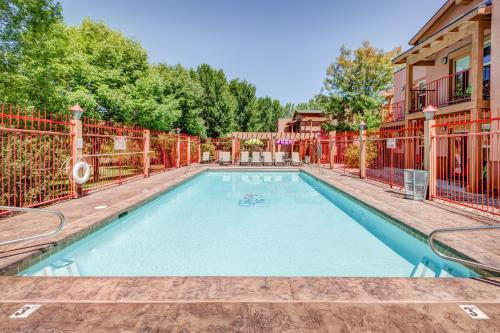 a swimming pool in the backyard of a house at The Gonzo Inn in Moab