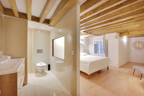 Kúpeľňa v ubytovaní Spacious apartment - 4BR-15P - Sentier-Grand Rex