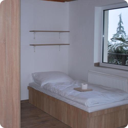 Postel nebo postele na pokoji v ubytování Ubytovňa Bunetice