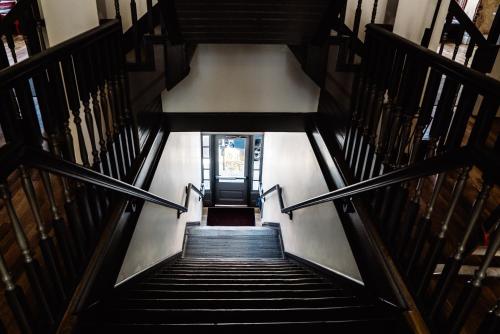 an overhead view of a staircase in a building at Hostel Fish in Denver