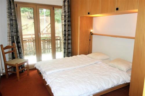 Postel nebo postele na pokoji v ubytování Melezes S 033 - SKI LIFT apartment 8 pers