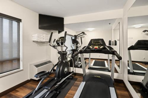 a gym with two treadmills and a treadmill at Comfort Inn in Saint Thomas