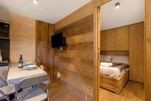 Postel nebo postele na pokoji v ubytování Studio Entrèves