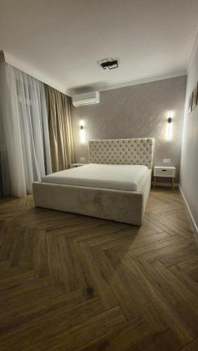 Ένα ή περισσότερα κρεβάτια σε δωμάτιο στο Scandi LOFT 93 Oradea ARED