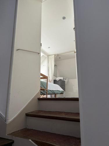 Maison des 7 lieuxにあるベッド