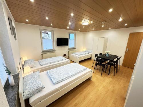 Ένα ή περισσότερα κρεβάτια σε δωμάτιο στο Worker Apartment near Reutlingen