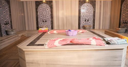 a altar in a mosque with a table with towels at Elite World Resort Mersin Silifke in Silifke