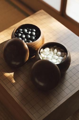 two bowls filled with pills on a table at 菖栖庵 八ヶ岳 一棟貸し in Hokuto