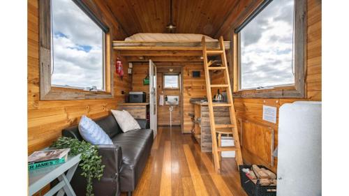 Ruang duduk di Altitude - A Tiny House Experience in a Goat Farm by Tiny Away