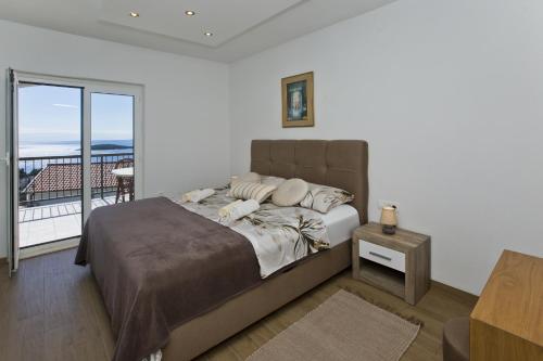 Ένα ή περισσότερα κρεβάτια σε δωμάτιο στο Kuća Gorjana