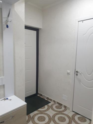 a bathroom with a toilet and a sink at Botanica, Shoping Molldova Testimiţianu in Chişinău